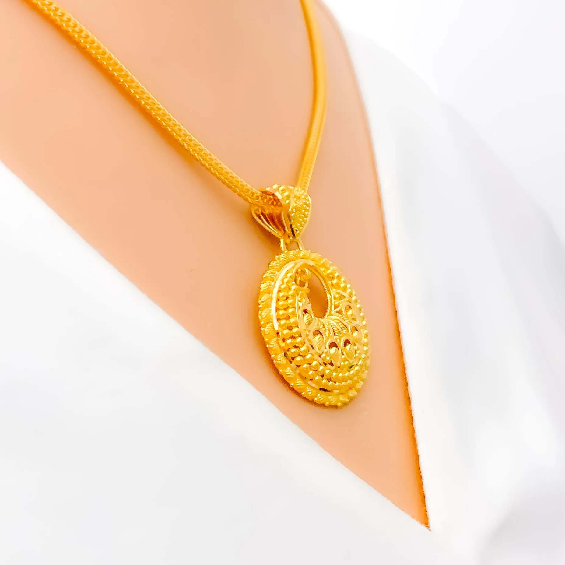 Beautiful Peacock Feather Adorned 22k Gold Pendant