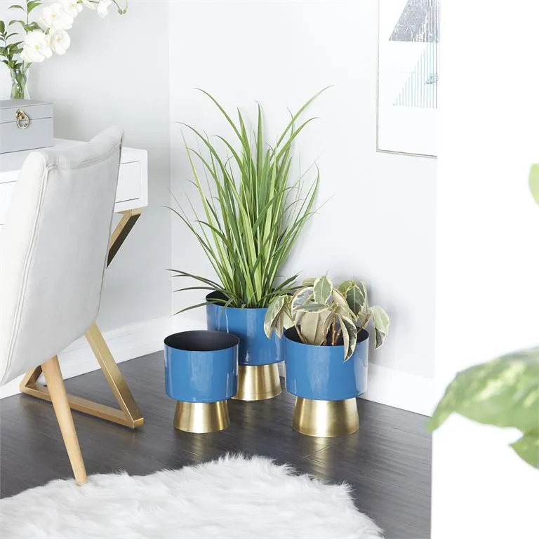 BLUE METAL PLANTER WITH GOLD BASE